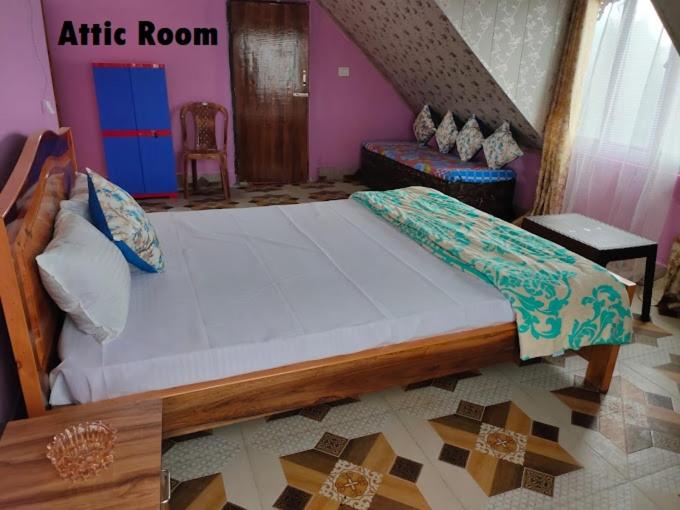Postel nebo postele na pokoji v ubytování LEPCHA'S ETHNIC HOMESTAY Kalimpong, kanchenjunga View, Near Morgan House