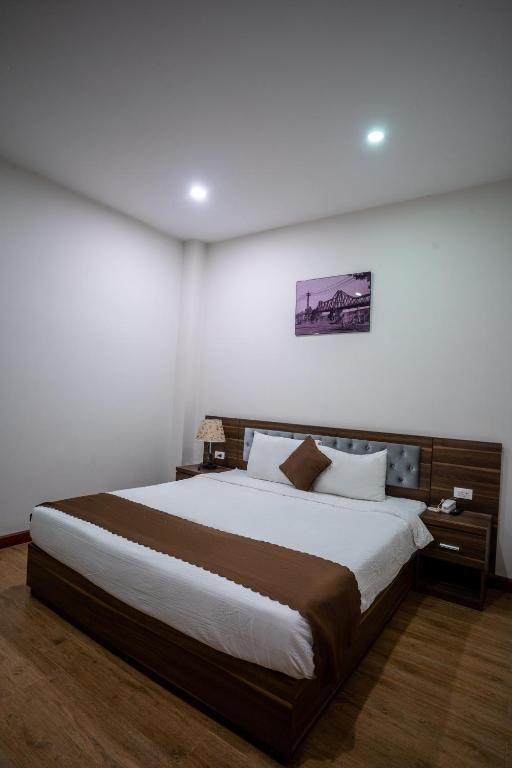 Giường trong phòng chung tại Mai Khanh Hotel