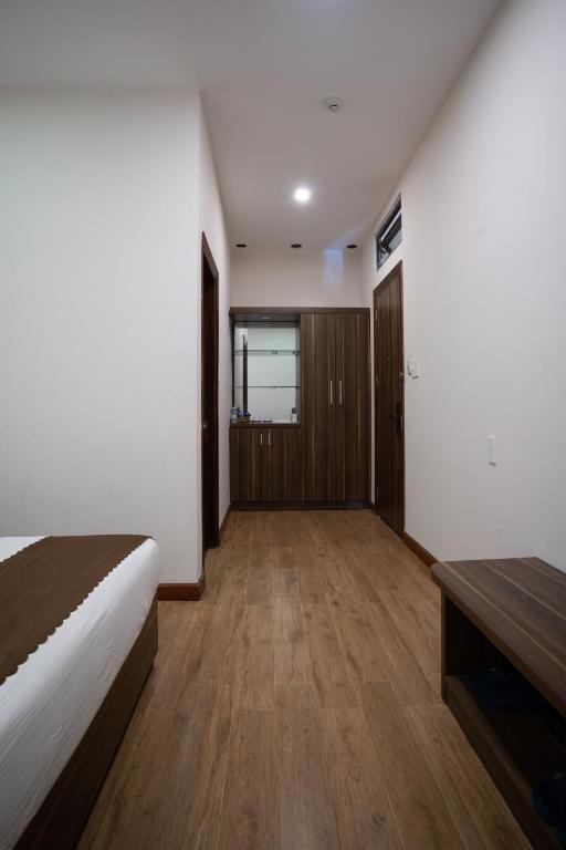 Giường trong phòng chung tại Mai Khanh Hotel