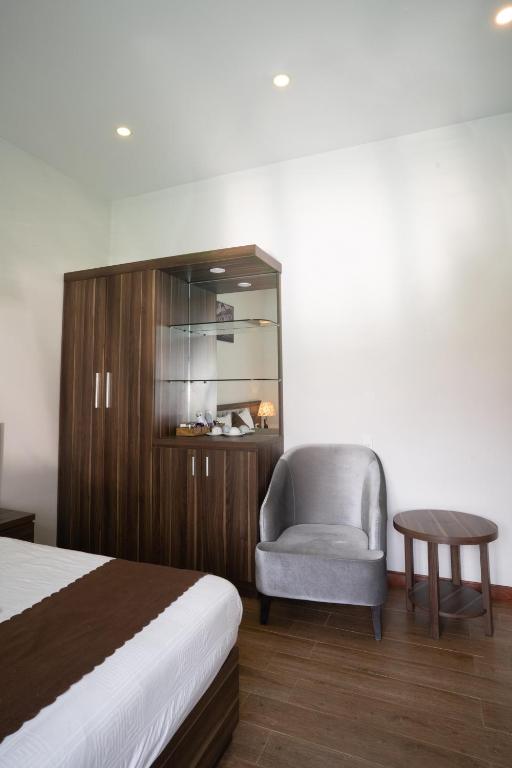 Giường trong phòng chung tại Mai Khanh Hotel