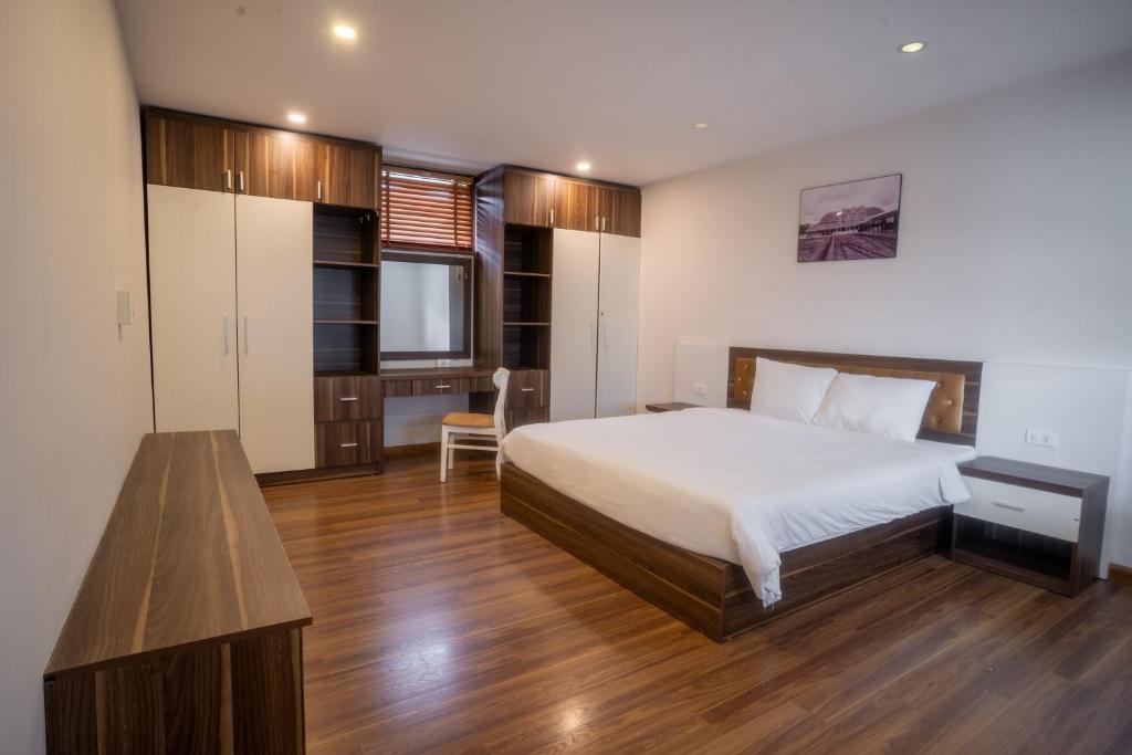 Giường trong phòng chung tại Mai Khanh Hotel