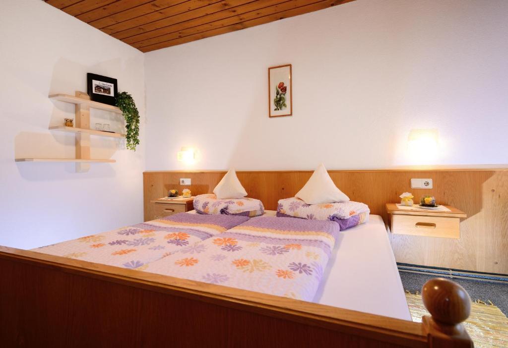 Postel nebo postele na pokoji v ubytování Haus Renate