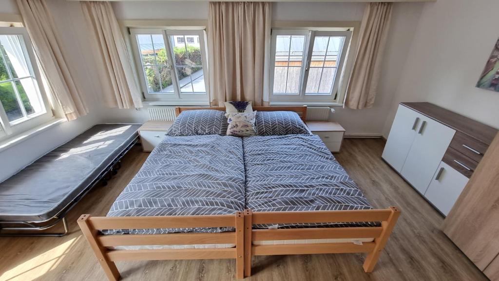 Postel nebo postele na pokoji v ubytování ZADRA Home