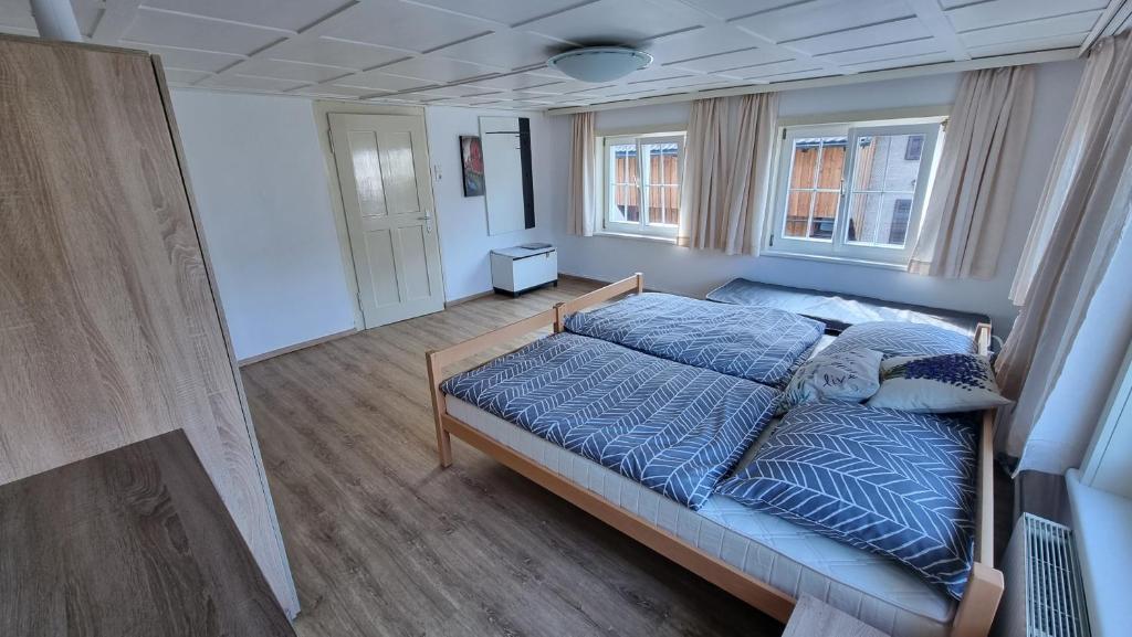 Postel nebo postele na pokoji v ubytování ZADRA Home