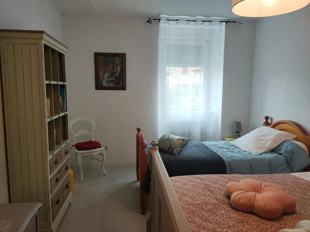 Posteľ alebo postele v izbe v ubytovaní Meublé 3 étoiles dans un petit village du Gers