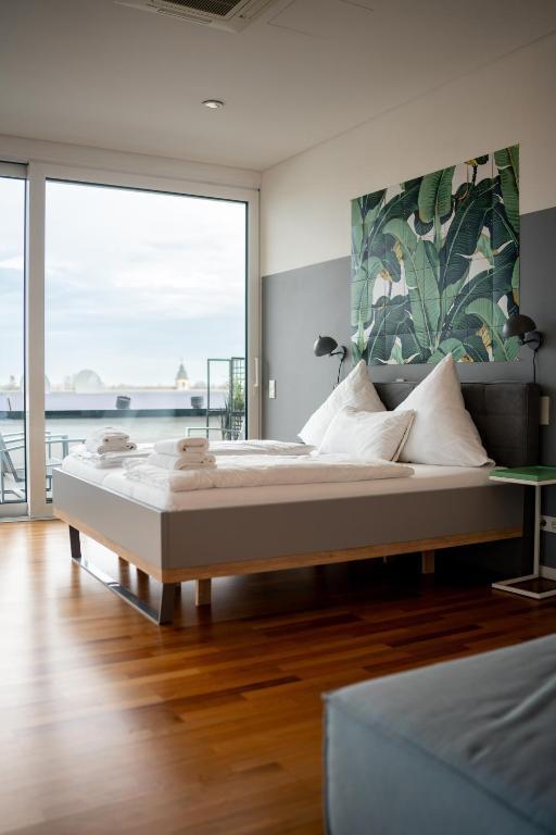 Postel nebo postele na pokoji v ubytování Hotel Soho