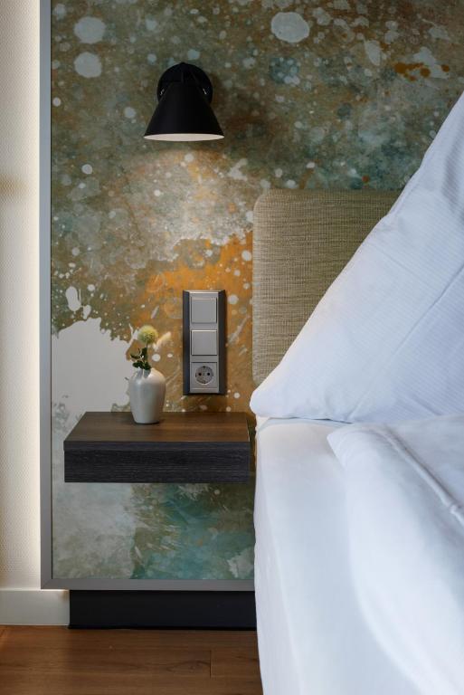Postel nebo postele na pokoji v ubytování Hotel Soho