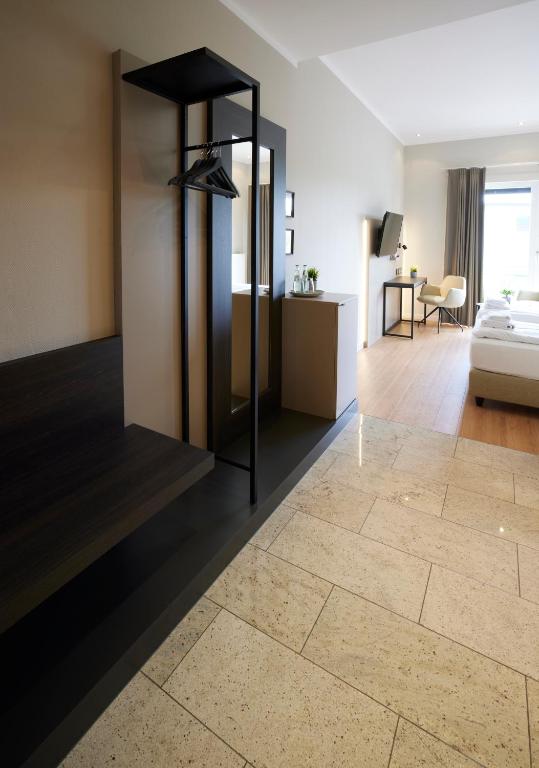 Postel nebo postele na pokoji v ubytování Hotel Soho