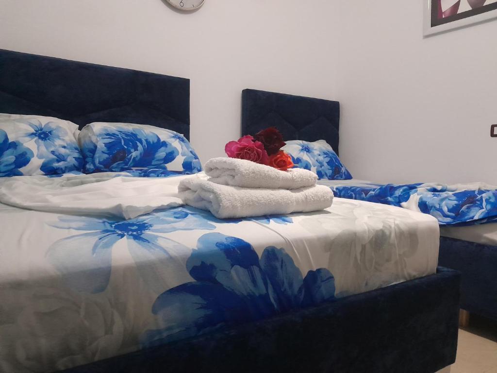 Postel nebo postele na pokoji v ubytování Apartments Denis