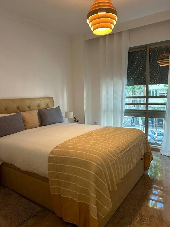 Postel nebo postele na pokoji v ubytování REGIDOR Cartagena