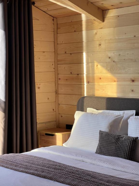 Postel nebo postele na pokoji v ubytování Bonita Cottage Ada Bojana