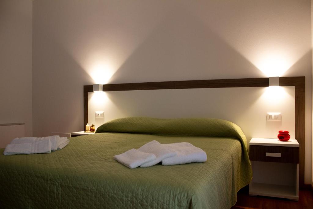 Postel nebo postele na pokoji v ubytování Agritur Maso Valli