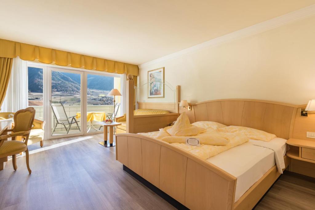 Postel nebo postele na pokoji v ubytování Hotel Funggashof