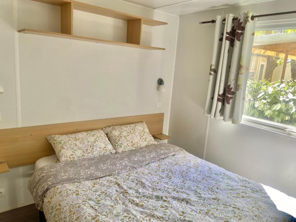 Postel nebo postele na pokoji v ubytování Tiny House, Mobilhome 6 personnes au Port de Vendres plage