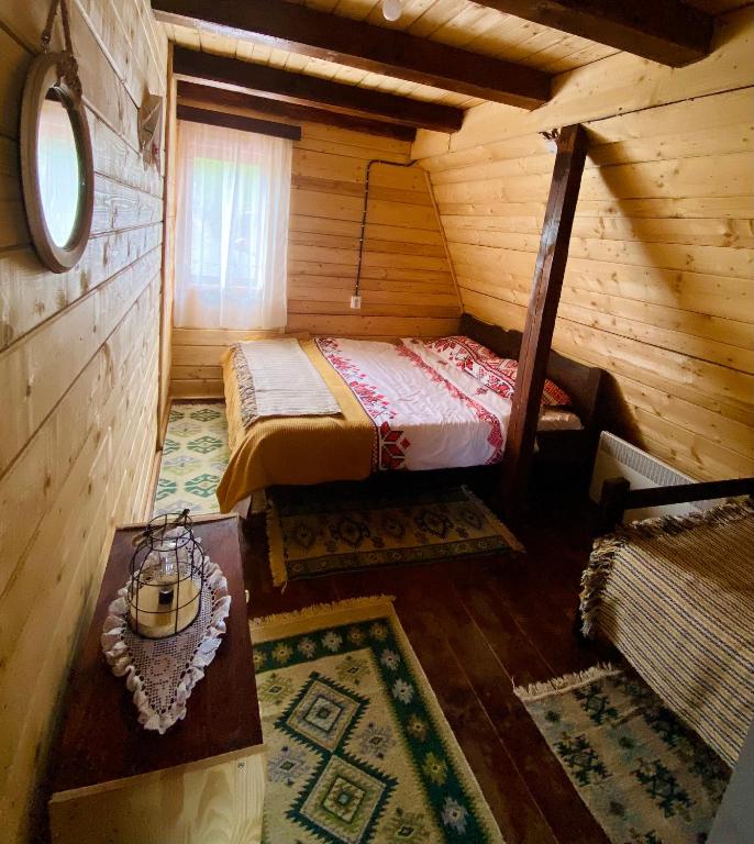 Postel nebo postele na pokoji v ubytování La Șofran