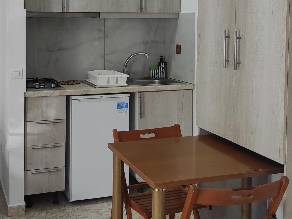 Kuchyň nebo kuchyňský kout v ubytování Sunset Studios