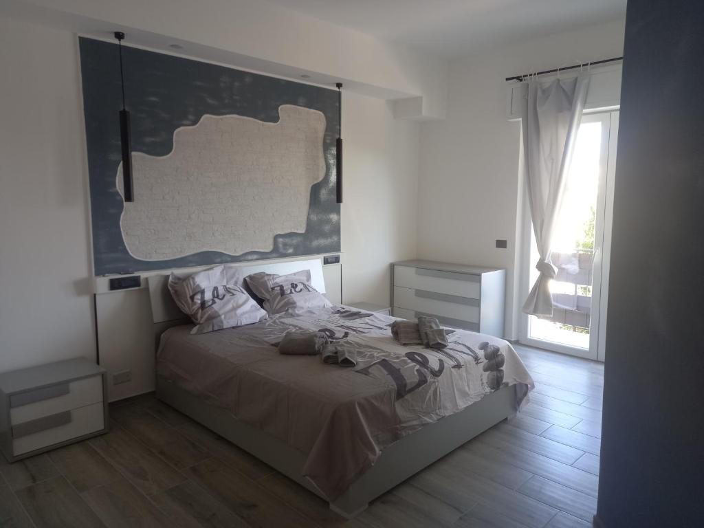 Postel nebo postele na pokoji v ubytování La Fenice 40