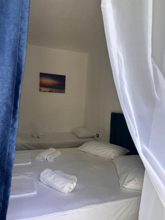 Postel nebo postele na pokoji v ubytování Mabel Rooms