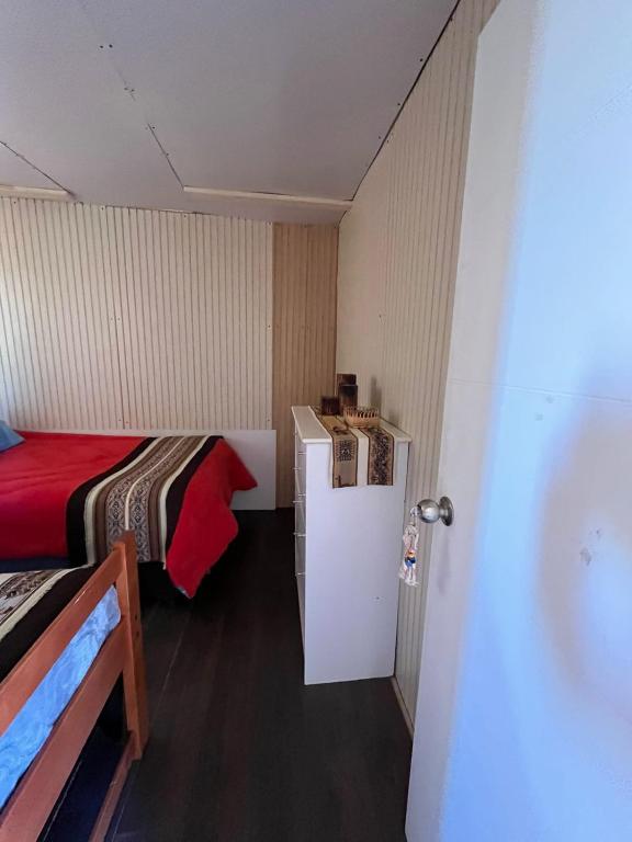 Postel nebo postele na pokoji v ubytování Retiro Bajoestrellas