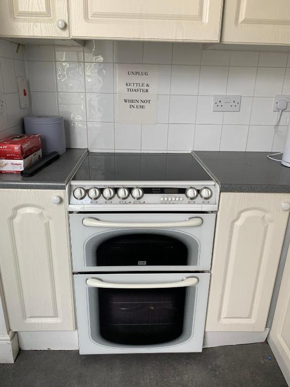 a kitchen with a white oven in a kitchen at Nle in Dublin