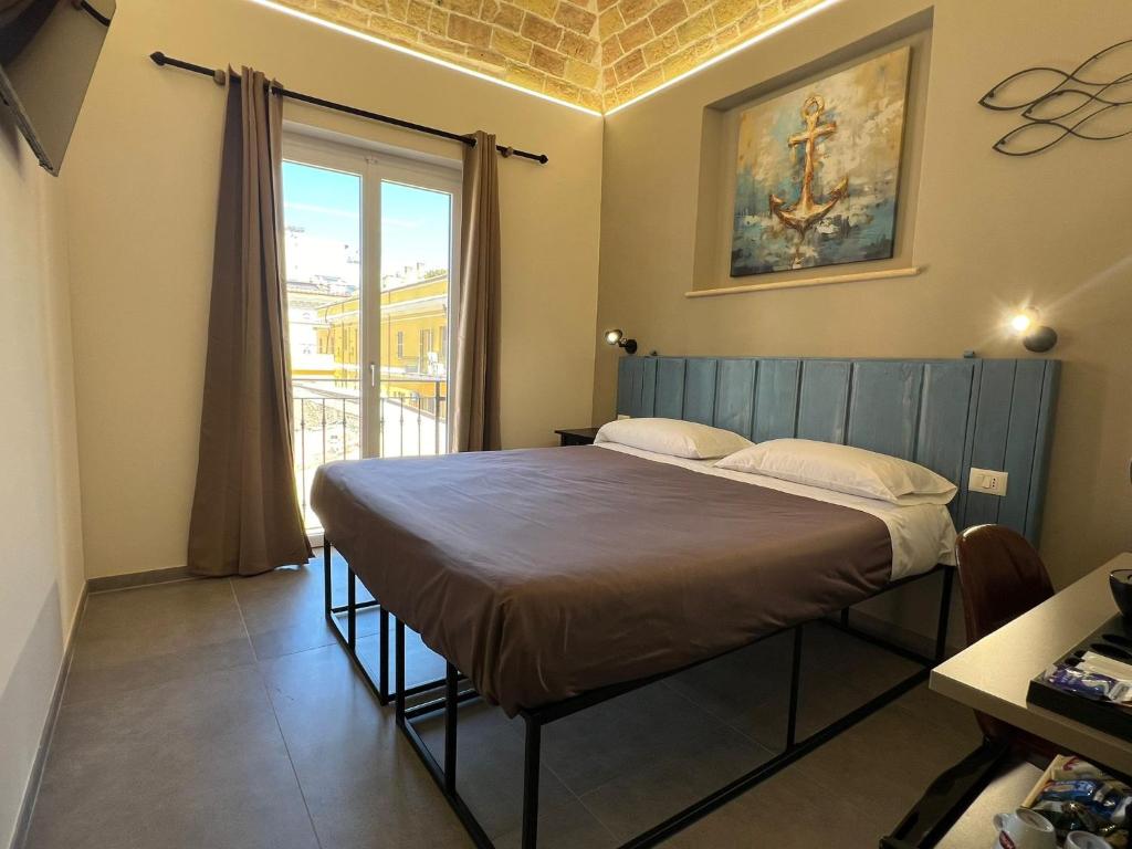 Postel nebo postele na pokoji v ubytování PescarAmare rooms