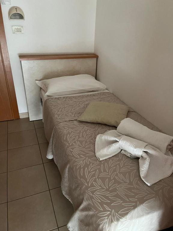 Postel nebo postele na pokoji v ubytování Hotel Vienna Rivazzurra