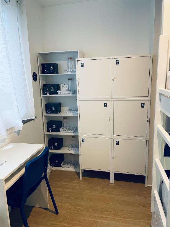 Kuchyň nebo kuchyňský kout v ubytování Partenope Hostel and Suites