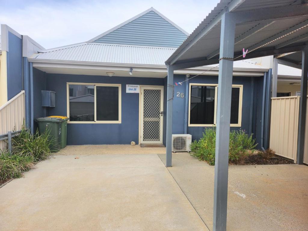 a blue house with a blue roof at Unit 26 Seafront Estate in Jurien Bay