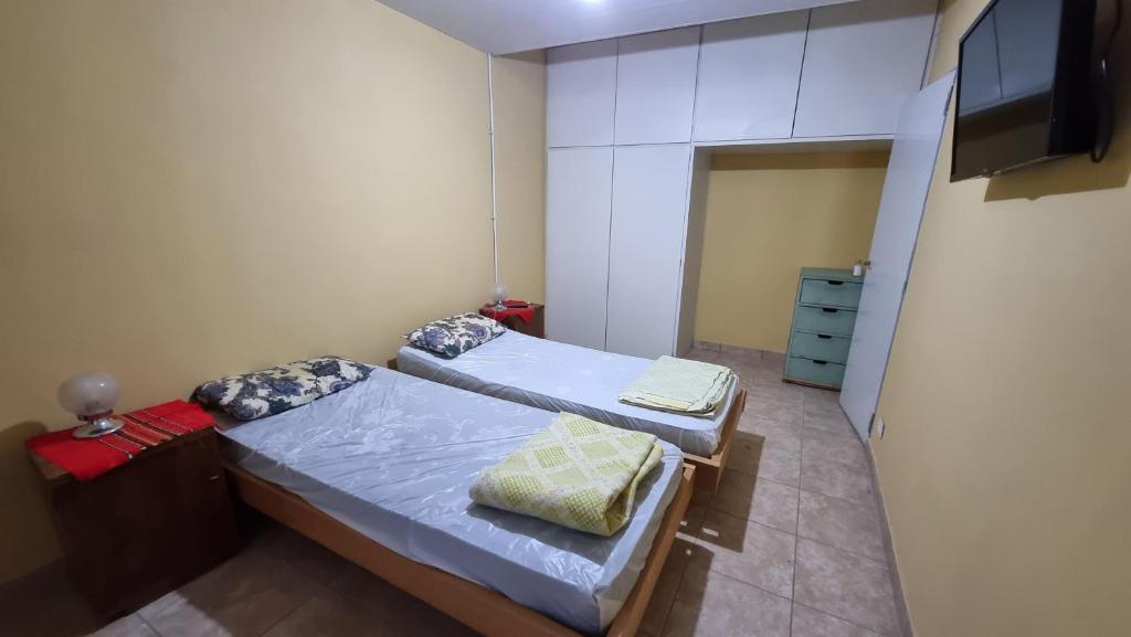 Un pat sau paturi într-o cameră la Departamento El Membrillo