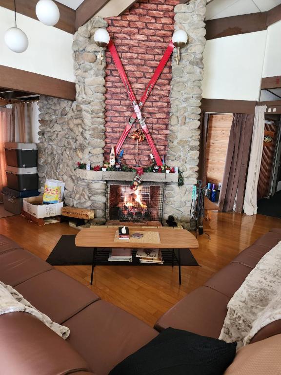 Posezení v ubytování Myoko Ski Lodge in Akakura Village