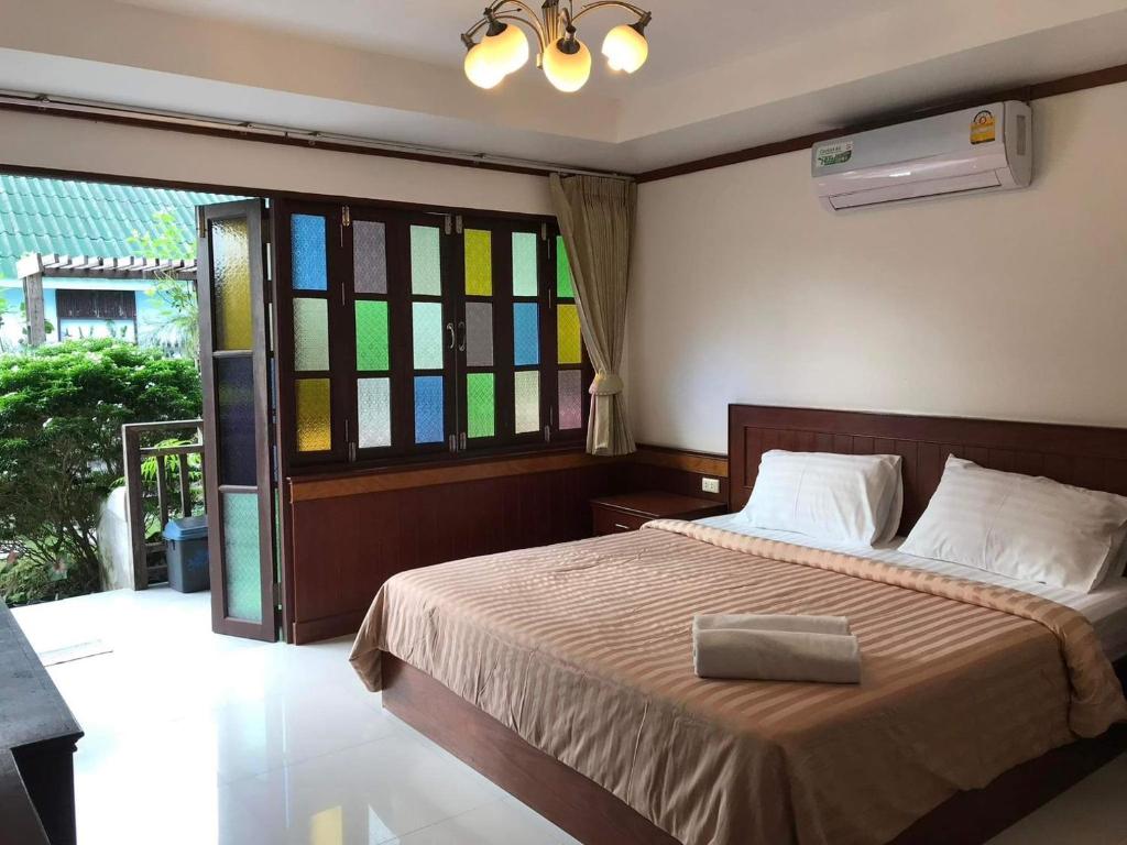Katil atau katil-katil dalam bilik di A la maison Koh Chang