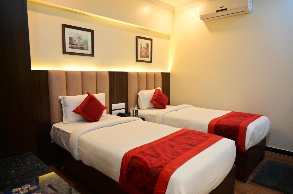 Postel nebo postele na pokoji v ubytování Hotel Golden Riviera