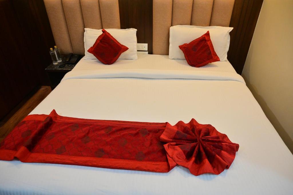 Postel nebo postele na pokoji v ubytování Hotel Golden Riviera