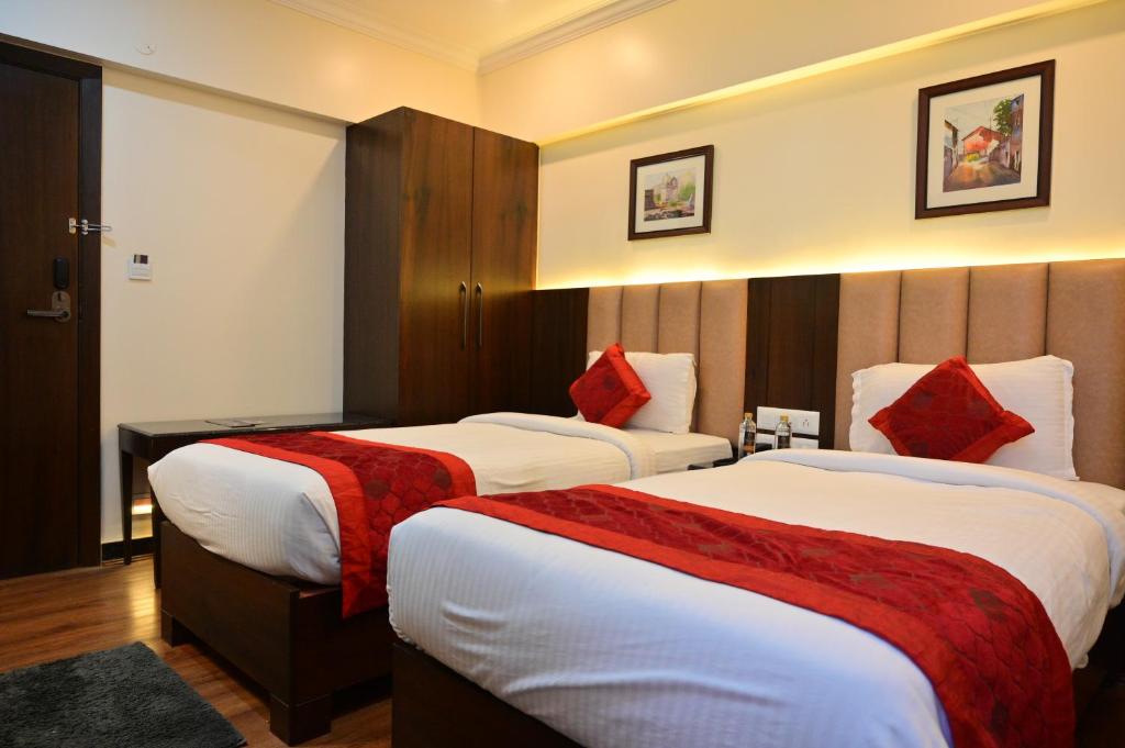 Postel nebo postele na pokoji v ubytování Hotel Golden Riviera