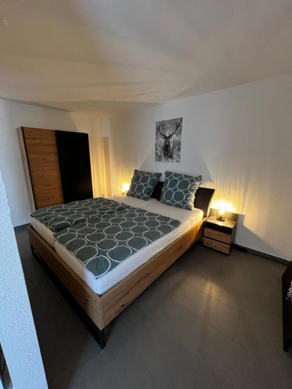 מיטה או מיטות בחדר ב-Schönes Apartment mit Terrasse