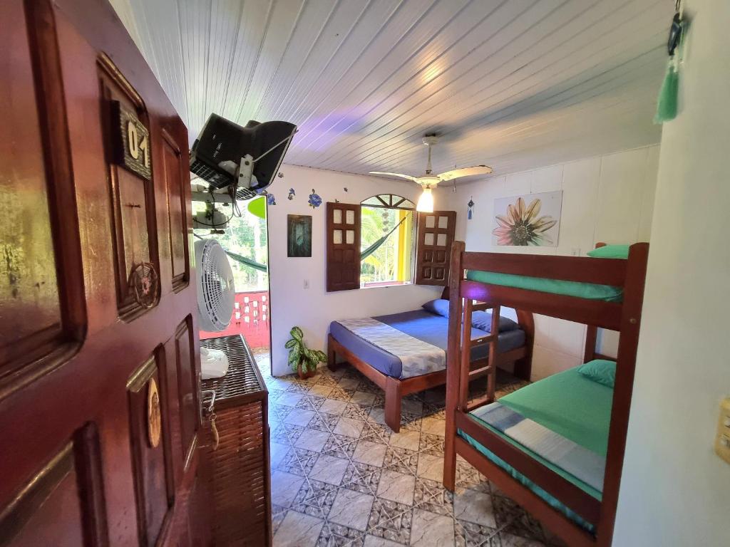 Postel nebo postele na pokoji v ubytování Jurema Hostel