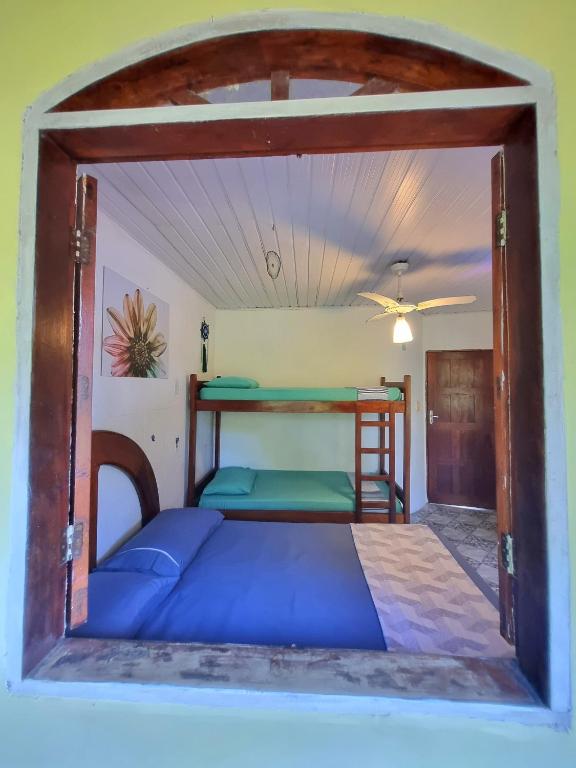 Postel nebo postele na pokoji v ubytování Jurema Hostel