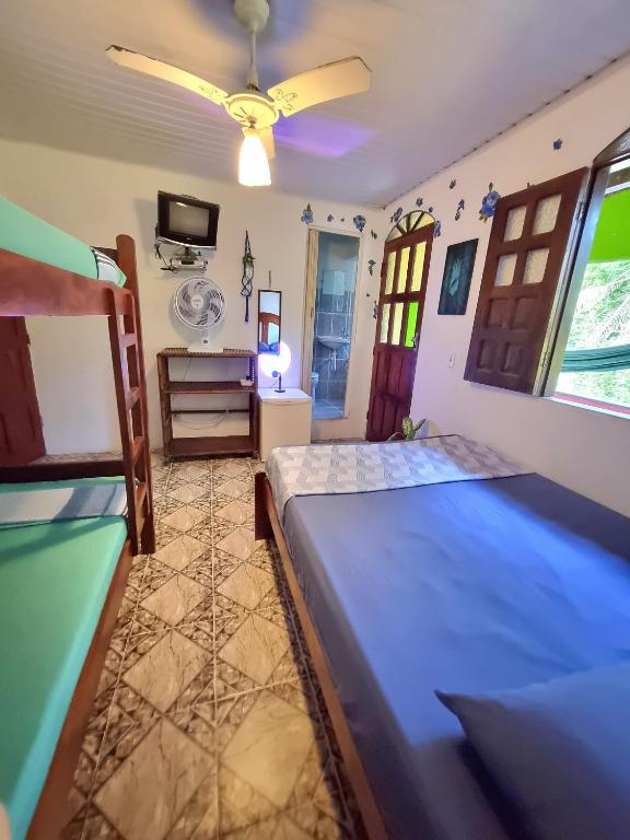 Postel nebo postele na pokoji v ubytování Jurema Hostel