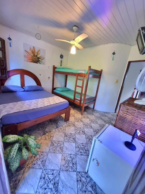 Postel nebo postele na pokoji v ubytování Jurema Hostel