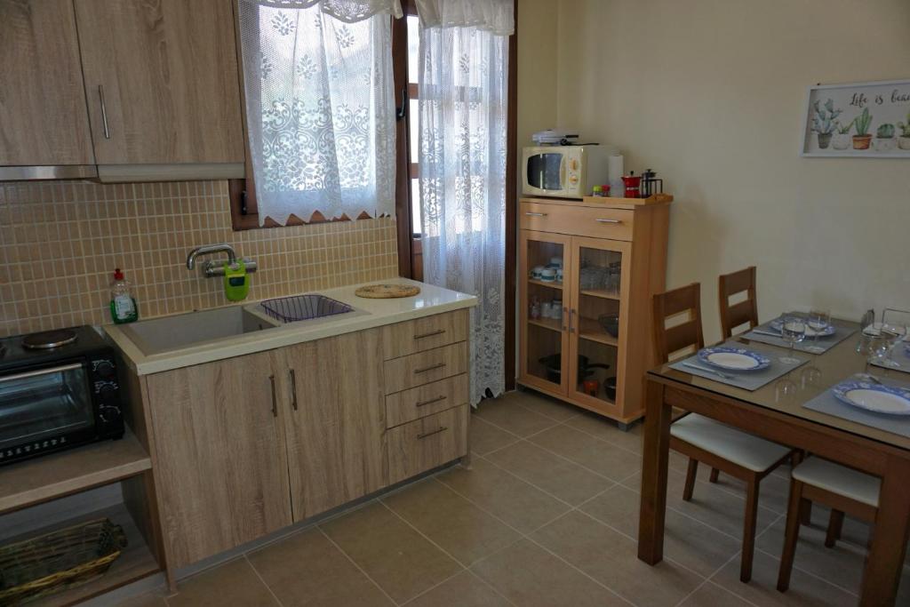 Kuchyňa alebo kuchynka v ubytovaní AnnaMaria House