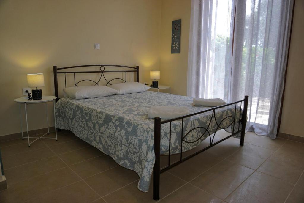Posteľ alebo postele v izbe v ubytovaní AnnaMaria House