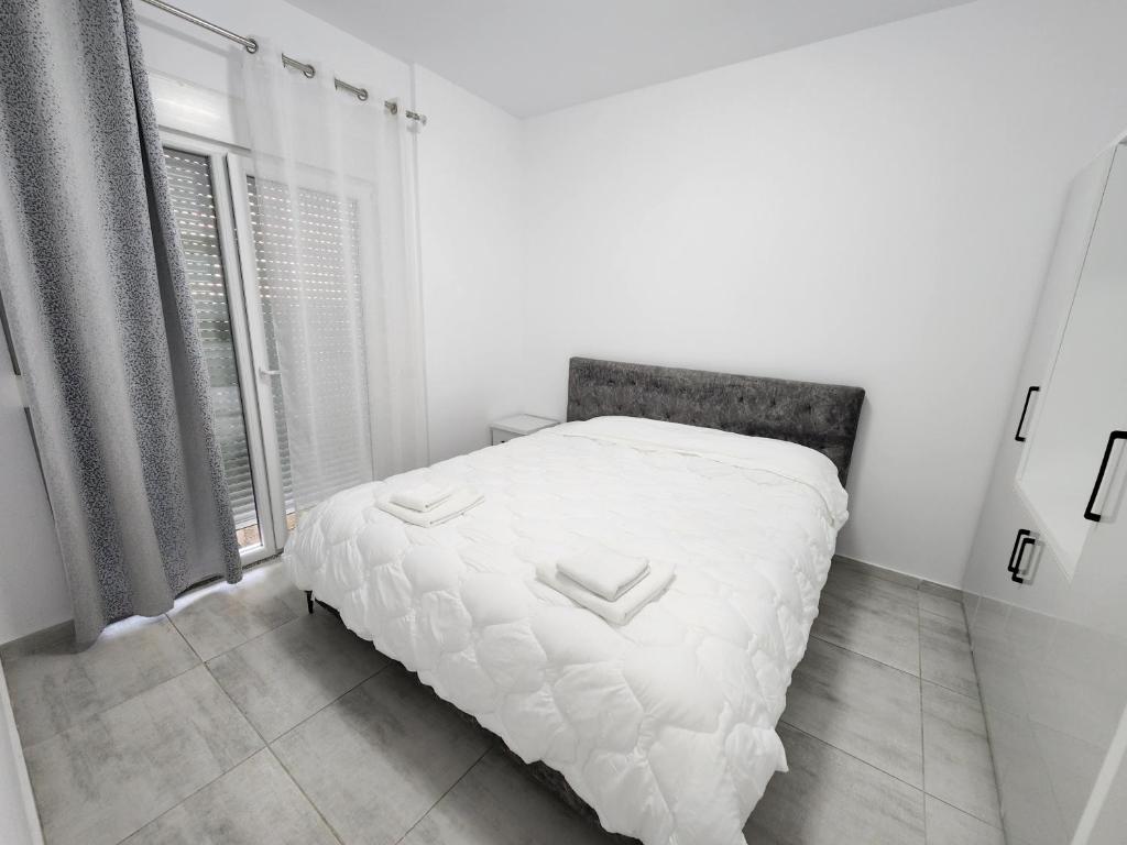 Postel nebo postele na pokoji v ubytování Anchor Apartments