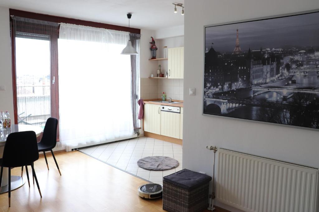 een woonkamer met een grote tv aan de muur bij Budapest Penthouse & View in Boedapest