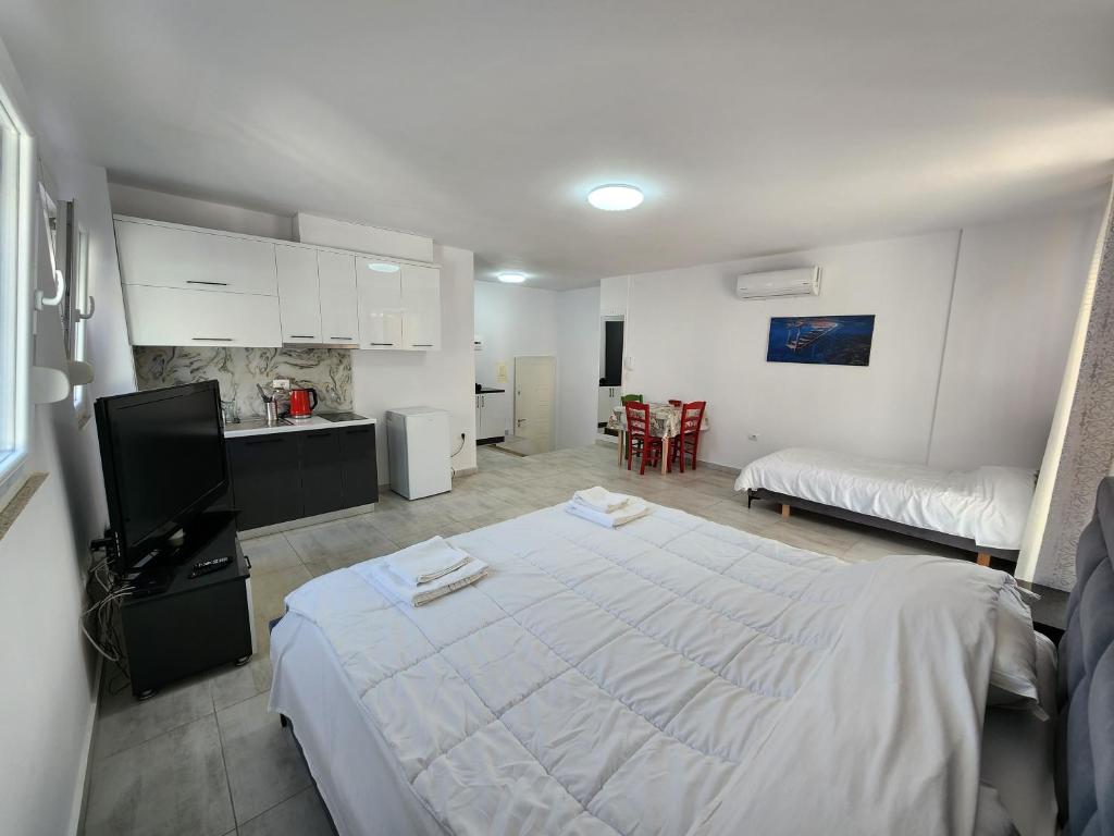 Kuchyň nebo kuchyňský kout v ubytování Anchor Apartments
