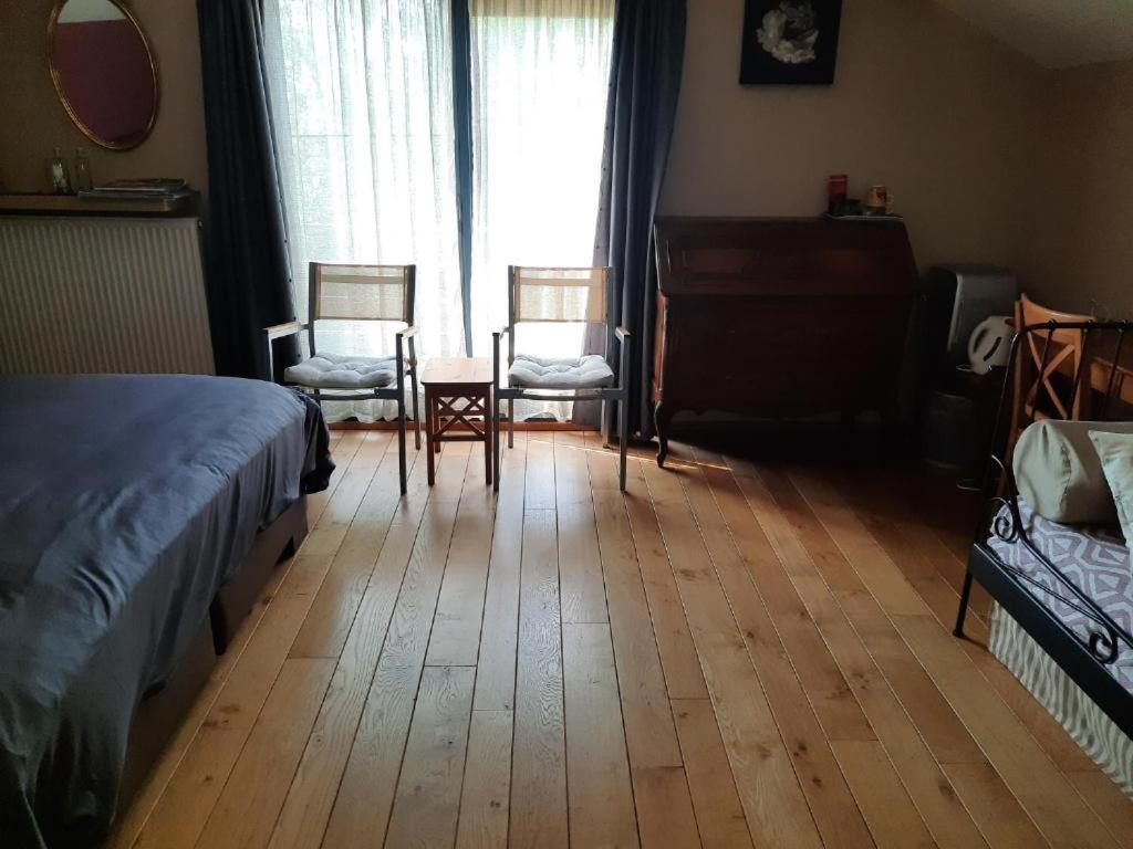 Postel nebo postele na pokoji v ubytování B&B Lomolen