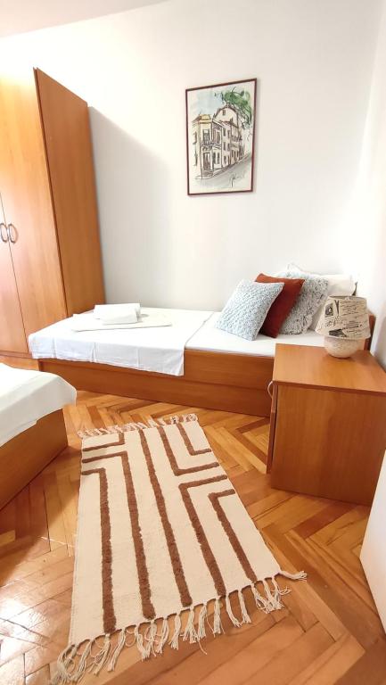 Posteľ alebo postele v izbe v ubytovaní Deluxe Apartman Pervan