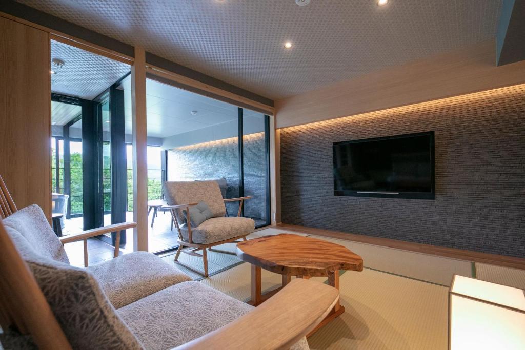 TV a/nebo společenská místnost v ubytování Hotel Higashidate