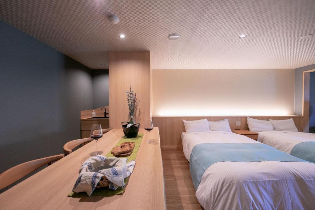 Postel nebo postele na pokoji v ubytování Hotel Higashidate