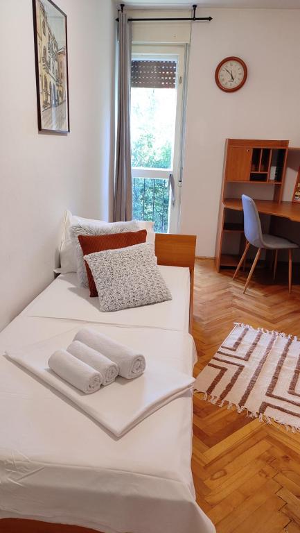 Posteľ alebo postele v izbe v ubytovaní Deluxe Apartman Pervan