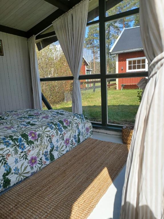 Postel nebo postele na pokoji v ubytování Hemma fran Hemma - Glamping